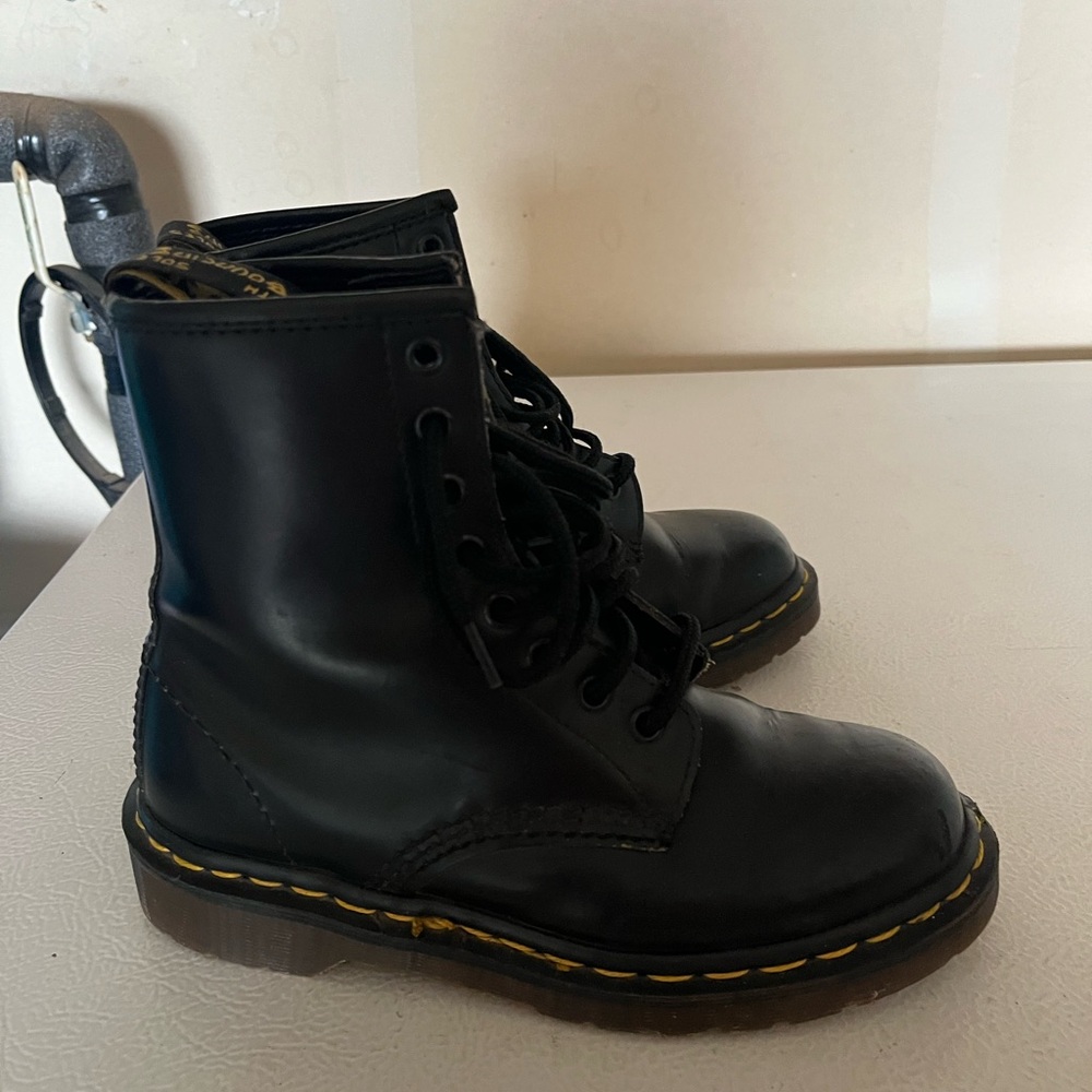 Dr. Martens Black and Yellow Combat Boots with Iconic Stitching